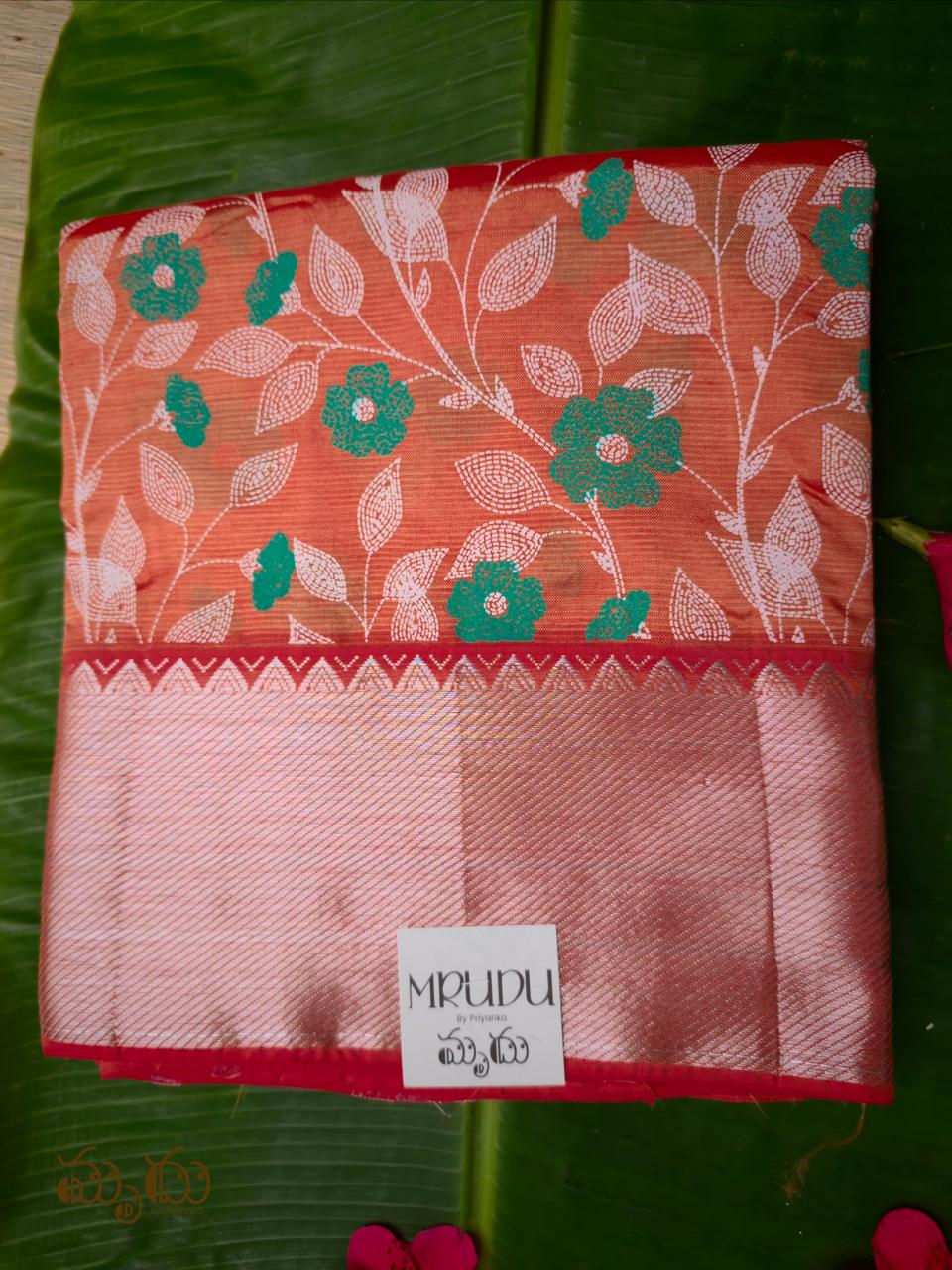 Rust-Orange Mangalagiri Saree with Floral Batik-Style Prints